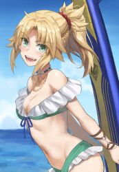 1girl bikini blonde_hair blue_sky blurry blurry_background breasts cloud day fangs fate/apocrypha fate_(series) frilled_bikini frills green_bikini green_eyes highres jewelry looking_at_viewer medium_breasts mordred_(fate) navel necklace o-ring open_mouth outdoors ponytail short_hair sky smile solo swimsuit tail teeth tonee