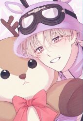 1boy animal_hat blonde_hair bow brown_eyes bucket_hat debwi_mos_hamyeon_jugneun_byeong_geollim goggles goggles_on_head hair_between_eyes hat high_collar highres korean_commentary looking_at_viewer lukapang male_focus purple_hat red_bow seon_ahyun short_hair smile solo stuffed_animal stuffed_deer stuffed_toy upper_body