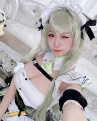 Rule 34 | breasts, cleavage, cosplay, goddess of victory: nikke, green eyes, highres, maid, maid headdress, medium breasts, necktie, one eye closed, selfie, tagme, wink