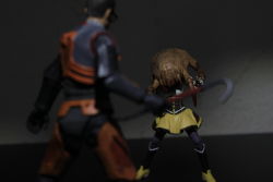 1boy 1girl absurdres armor blood blurry corset crossover crowbar dark depth_of_field figma figure fingerless_gloves glasses gloves gordon_freeman half-life half-life_(series) half-life_2 headcrab highres holding holding_crowbar mahou_shoujo_madoka_magica mahou_shoujo_madoka_magica_(anime) mami_mogu_mogu monster moonshine_animations parody photo_(medium) skirt tomoe_mami tomoe_mami_(magical_girl) weapon