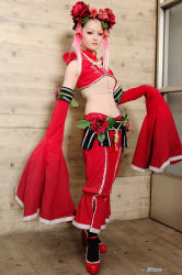 chest_wrap china_dress chinese_clothes cosplay dress flowerhead kawasaki_ai photo_(medium) pink_hair snk the_king_of_fighters xiao_lon
