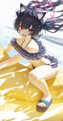1girl absurdres animal_ear_fluff animal_ears banana_boat bare_shoulders bikini black_bikini black_hair blue_archive cat_ears cat_girl extra_ears fang floating_hair frilled_bikini frills halo halterneck highres long_hair looking_at_viewer ocean open_mouth outdoors red_eyes red_halo sandals serika_(blue_archive) serika_(swimsuit)_(blue_archive) skin_fang slit_pupils solo songchuan_li sparkle swimsuit thighs toenails toes twintails water