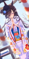 1girl alternate_costume animal_ears blue_flower blue_rose flipped_hair floral_print flower hair_over_one_eye highres horse_ears horse_girl japanese_clothes kimono long_hair own_hands_clasped own_hands_together praying rice_shower_(umamusume) rope rose shimenawa snow solo tilted_headwear torii umamusume yomean!
