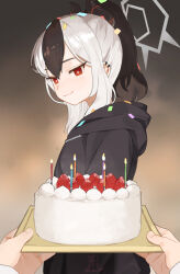 1girl 1other birthday birthday_cake black_hair black_hoodie black_horns blue_archive cake candle closed_mouth commentary_request confetti demon_horns food hair_between_eyes halo holding holding_tray hood hood_down hoodie horns kayoko_(blue_archive) looking_at_viewer ponytail pov pov_hands red_eyes sidelocks smile solo_focus sou_(pale_1080) standing strawberry_shortcake tray