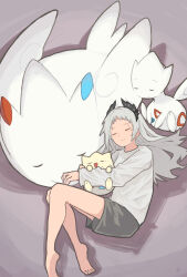 1girl arknights black_shorts closed_eyes donki_(yeah) evolutionary_line game_freak gen_2_pokemon gen_4_pokemon grey_hair head_wings highres irene_(arknights) long_hair long_sleeves nintendo pokemon pokemon_(creature) scar scar_across_eye scar_on_face shirt shorts sleeping solo togekiss togepi togetic white_shirt wings