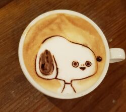 animal_focus coffee commentary_request cup dog food_art_(medium) george_(yamamoto_kazuki) highres latte_art latte_art_(medium) looking_at_viewer no_humans open_mouth original peanuts_(comic) photo_(medium) portrait sacabambaspis smile snoopy solo triangle_mouth unconventional_media