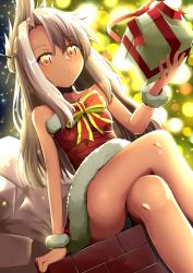1girl absurdres backlighting bare_shoulders blush borumete bow box breasts chloe_von_einzbern choker christmas crossed_legs dark-skinned_female dark_skin dress fate/grand_order fate_(series) female_focus fur-trimmed_dress fur_trim gift gift_box hair_ornament hairpin half_updo highres long_hair looking_at_viewer orange_eyes pink_hair red_bow red_dress sidelocks sitting small_breasts solo thighs wrist_cuffs