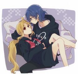 2girls ahoge black_hoodie blonde_hair blue_hair bocchi_the_rock! closed_mouth commentary cuddling eye_contact hand_on_another&#039;s_leg hood hoodie ijichi_nijika kessoku_band_hoodie_(bocchi_the_rock!) long_hair long_sleeves looking_at_another lying_on_lap mole mole_under_eye multiple_girls red_eyes short_hair yamada_ryo yuri yuuta_(monochrome)