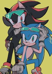 2boys animal_ears animal_nose aqua-tinted_eyewear aqua_eyes arm_up black_footwear black_fur blue_fur body_fur boots bracelet clenched_hand closed_mouth furry furry_male gloves goggles goggles_on_head gold_bracelet green_eyes grey_footwear grey_gloves hedgehog highres jewelry looking_at_viewer male_focus multicolored_footwear multiple_boys on_one_knee red_eyes red_footwear red_fur shadow_the_hedgehog shadow_the_hedgehog_(riders) short_tail simple_background smile sonic_(series) sonic_riders sonic_riders_(series) sonic_the_hedgehog sonic_the_hedgehog_(riders) standing tail tinted_eyewear two-tone_footwear two-tone_fur xxxxx0099e yellow_background