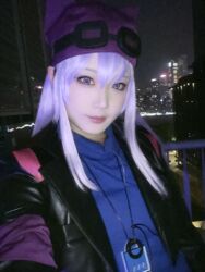 blue_shirt cosplay cosplay_photo digimon goggles goggles_on_head hat highres jacket lipstick looking_at_viewer makeup night night_sky photo_(medium) purple_eyes purple_hair real_life sayo_(digimon) sayo_(digimon)_(cosplay) shirt sky smile ybhk77