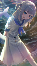 1girl absurdres alternate_costume arms_behind_back beach belt belt_buckle blue_eyes blue_hair blue_neckerchief blue_sailor_collar buckle commentary english_commentary fins fish_tail gami_(gami37260414) gawr_gura hair_ornament highres hololive hololive_english long_skirt looking_at_viewer multicolored_hair neckerchief ocean open_mouth pleated_skirt sailor_collar shark_girl shark_hair_ornament shark_tail sharp_teeth shirt skirt smile solo streaked_hair tail teeth twitter_username upper_body virtual_youtuber white_belt white_hair white_shirt