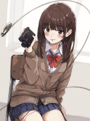 1girl blue_skirt bow bowtie brown_cardigan brown_eyes brown_hair camera cardigan chair collared_shirt commentary_request holding holding_camera looking_at_viewer medium_hair on_chair original red_bow red_bowtie school_chair school_uniform shimkarom shirt sitting skirt solo thighs white_shirt