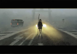 1girl black_hair black_shirt car female_focus fog glowing glowing_eyes holding letterboxed long_hair long_sleeves looking_at_viewer minivan motor_vehicle naginata original outdoors polearm rias-coast road road_sign shadow shirt sign solo standing torii very_long_hair weapon