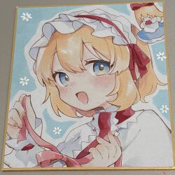 1girl :d alice_margatroid ascot blonde_hair blue_background blue_eyes capelet commentary floral_background flower frilled_ascot frilled_hairband frills hairband highres holding holding_ribbon looking_at_viewer marker_(medium) moni_monico open_mouth portrait red_ascot red_hairband red_ribbon ribbon shanghai_doll short_hair smile solo symbol-only_commentary touhou traditional_media tying white_capelet white_flower wrist_cuffs