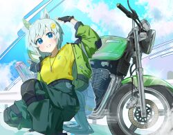 1girl alternate_costume animal_ears arm_up black_gloves blue_eyes blue_hair collarbone commentary ear_covers english_commentary fingerless_gloves gloves green_jacket green_pants grin highres horse_ears horse_girl horse_tail jacket jewelry long_sleeves looking_at_viewer motor_vehicle motorcycle necklace open_clothes open_jacket pants seiun_sky_(umamusume) shirt short_hair single_ear_cover smile solo squatting tail tetra_(ktet4_illu) umamusume yellow_shirt