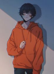 1boy against_wall bandaid bandaid_on_cheek bandaid_on_face black_hair black_pants blue_eyes closed_mouth collarbone commentary cowboy_shot hair_between_eyes highres hood hoodie looking_at_viewer male_focus moxamog orange_hoodie original pants shaded_face shadow short_hair sleeves_past_wrists solo standing symbol-only_commentary