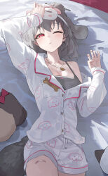 1girl absurdres bandaid bandaid_on_thigh black_bra black_hair bra breasts cleavage hair_bun hair_ornament hair_stick hairclip highres jewelry long_sleeves looking_at_viewer lying mac_star necklace on_back one_eye_closed original pajamas red_eyes shorts single_hair_bun small_breasts solo underwear white_pajamas white_shorts