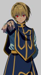 1boy arm_behind_back betti_(xx_betti) blonde_hair blue_tabard closed_mouth commentary cowboy_shot frown grey_background hand_chains hashtag-only_commentary highres hunter_x_hunter kurapika long_sleeves looking_at_viewer male_focus outstretched_arm red_eyes sanpaku shirt short_hair simple_background solo tabard white_shirt