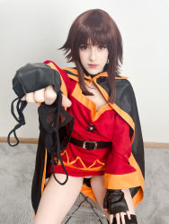 Rule 34 | 1girl, absurdres, belt, black cape, black gloves, black panties, black thighhighs, blunt bangs, brown hair, cape, carpet, chair, cosplay, cosplay photo, dress, expressionless, eyelashes, eyeliner, fingerless gloves, gloves, heart maebari, highres, holding, holding unworn clothes, holding panties, holding underwear, holding unworn clothes, indoors, kono subarashii sekai ni shukufuku wo!, lips, long hair, long sleeves, maebari, makeup, megumin, megumin (cosplay), mole, no panties, orange trim, panties, photo (medium), red dress, red eyes, sidelocks, single thighhigh, sitting, solo, stelarhoshi, thighhighs, transparent, underwear, wall