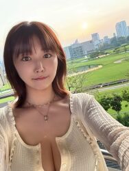 1girl breasts cleavage collarbone highres japanese_(nationality) jewelry large_breasts lipstick looking_at_viewer makeup matsumoto_nanami necklace outdoors photo_(medium) selfie short_hair standing sunset