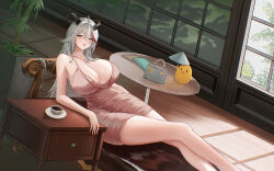 1girl absurdres aegir_(azur_lane) aegir_(one-on-one_leisure_time)_(azur_lane) azur_lane black_horns breasts crossed_bangs dress feet_out_of_frame from_above hair_between_eyes hand_on_table highres horns indoors large_breasts ling_yi_de_lei_ke looking_at_viewer looking_up manjuu_(azur_lane) multicolored_hair official_alternate_costume open_mouth pink_dress reclining red_hair short_dress solo spaghetti_strap streaked_hair two-tone_hair white_hair yellow_eyes