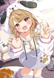 1girl :d absurdres animal_ears animal_hood bell blonde_hair blush breasts claw_pose collarbone commission dog_ears fang food green_nails highres hood hood_up hoodie indoors jingle_bell long_hair long_sleeves looking_at_viewer multicolored_nails nail_polish open_mouth original paw_print pink_nails red_eyes shiro9jira skeb_commission skin_fang smile socks solo standing table virtual_youtuber white_hoodie
