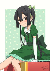 1girl 2014 black_hair box brown_eyes dated dress elbow_gloves errant female_focus gloves green_dress hair_ribbon k-on! long_hair nakano_azusa ribbon sitting smile solo twintails