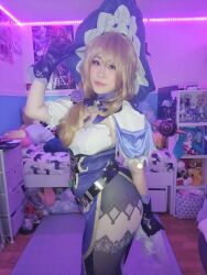 Rule 34 | ass, blonde hair, breasts, cleavage, cosplay, cosplay photo, from side, genshin impact, hat, jewelry, lisa (genshin impact), lisa (genshin impact) (cosplay), medium breasts, necklace, pantyhose, photo (medium), real life, thighs, witch, witch hat