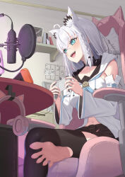 1girl 35p_(sakura_miko) :d absurdres ahoge animal_ear_piercing animal_ears aqua_eyes bangom_r barefoot black_shorts black_thighhighs blue_neckerchief braid chair commentary controller crossed_bangs detached_sleeves double-parted_bangs english_commentary extra_ears feet fox_ears fox_girl front_slit fubuzilla_(shirakami_fubuki) game_controller gaming_chair hair_between_eyes handheld_game_console highres holding holding_controller holding_game_controller hololive hood hooded_vest hoodie indoors long_hair low_ponytail microphone miteiru_(shirakami_fubuki) neckerchief on_chair open_mouth pekomon_(usada_pekora) ponytail shirakami_fubuki shirakami_fubuki_(1st_costume) short_shorts shorts side_braid single_bare_foot single_thighhigh sitting smile soles solo swivel_chair teeth thighhighs toes upper_teeth_only vest virtual_youtuber white_hair white_sleeves wide_sleeves