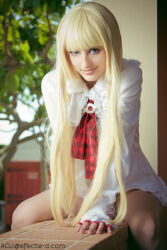 Rule 34 | 1girl, blonde hair, blue eyes, cosplay, emilie de rochefort, emilie de rochefort (cosplay), ivychann, long hair, long sleeves, looking at viewer, photo (medium), real life, sitting, spanish (nationality), tekken, thighs, tree