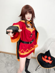 Rule 34 | 1girl, absurdres, asymmetrical legwear, belt, belt collar, black cape, black hat, black socks, breasts, brown hair, cape, carpet, chair, collar, cosplay, cosplay photo, dress, feet out of frame, hat, highres, indoors, kneehighs, kono subarashii sekai ni shukufuku wo!, looking at viewer, megumin, megumin (cosplay), mismatched legwear, photo (medium), pointing, pointing at viewer, red dress, red eyes, sidelocks, single kneehigh, single sock, small breasts, smile, socks, solo, staff, stelarhoshi, transparent, unworn headwear, witch hat