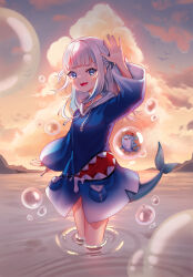 1girl animal_costume aqua_nails blue_eyes blue_hair blue_hoodie bubble cloud cloudy_sky fingernails fins fish_tail gawr_gura gawr_gura_(1st_costume) hair_ornament hand_up highres hololive hololive_english hood hood_down hoodie laggingdlc long_hair looking_at_viewer medium_hair multicolored_hair ocean open_mouth pocket shark_costume shark_girl shark_hair_ornament shark_tail sharp_teeth sky smile solo standing streaked_hair tail tearing_up teeth two_side_up virtual_youtuber waving white_hair