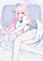 1girl absurdres bed blue_archive blue_bow blue_bowtie bow bowtie feathered_wings hair_bun hair_ornament halo hand_on_own_face highres long_hair melozr mika_(blue_archive) on_bed open_mouth pantyhose pillow pink_hair pink_halo sidelocks smile solo white_pantyhose wings yellow_eyes
