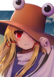 1girl blonde_hair blue_sky blush border brown_hat cloud commentary_request evening grin hair_ribbon hand_on_headwear hat highres long_hair long_sleeves looking_at_viewer moriya_suwako one_eye_covered parted_bangs partial_commentary purple_vest red_eyes ribbon saisoku_no_yukkuri shirt sky smile smirk solo touhou tress_ribbon turtleneck upper_body vest white_border white_shirt wide_sleeves