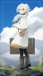 1girl absurdres black_pantyhose blue_sky boots brown_boots capelet cloud daku_k day earrings elf frieren from_side full_body grass green_eyes highres holding holding_suitcase inset_border jewelry long_hair long_sleeves looking_at_viewer miniskirt mouth_hold outdoors pantyhose parted_bangs pointy_ears rock skirt sky solo sousou_no_frieren stalk_in_mouth standing suitcase teardrop_earrings white_capelet white_skirt