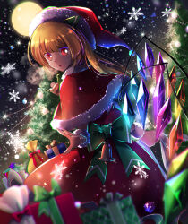 1girl bag bell blonde_hair blurry bow box capelet christmas christmas_tree crystal_wings depth_of_field dress english_text flandre_scarlet full_moon fur-trimmed_capelet fur-trimmed_headwear fur-trimmed_wrist_cuffs fur_trim gift gift_box green_bow green_ribbon hair_ribbon hat long_hair looking_back moon multicolored_wings neck_bell night night_sky red_capelet red_dress red_eyes ribbon santa_costume santa_hat sky snowflakes snowing solo touhou tree wings zukapin