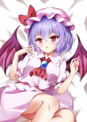 1girl absurdres ascot bat_wings belt blue_gemstone blush bow breasts brooch collared_dress commentary_request dress feet_out_of_frame fingernails frills gem hair_between_eyes hands_up hat hat_bow highres jewelry long_fingernails looking_at_viewer lying medium_breasts mob_cap nail_polish on_bed on_side open_mouth pink_dress pink_hat pink_nails pointy_ears puffy_short_sleeves puffy_sleeves purple_hair red_ascot red_belt red_bow red_eyes remilia_scarlet shirotsuki_shirone short_hair short_sleeves solo sparkle touhou wings