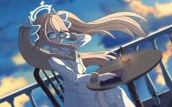 1girl ahoge blonde_hair blue_archive blue_eyes blurry blurry_foreground book bow chair cloud cloudy_sky commentary_request dutch_angle feather_hair hair_bow hair_ornament hairpin halo highres ken_tontan lantern long_hair long_sleeves looking_at_viewer multicolored_hair orange_hair plaid_bow pleated_skirt school_uniform shimiko_(blue_archive) sitting skirt sky smile solo table twilight twintails yellow_halo