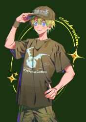 1boy absurdres baseball_cap blonde_hair blue_eyes cowboy_shot digimon green_background green_hat green_shirt hat highres male_focus ojing_oppa_(o_b_s_00) patamon shirt simple_background solo takaishi_takeru
