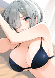 1girl absurdres bikini black_bikini blue_eyes blush breasts cleavage closed_mouth dyson_(edaokunnsaikouya) grey_hair hair_ornament hair_over_one_eye hairclip half-closed_eyes hamakaze_(kancolle) highres kantai_collection large_breasts looking_at_viewer lying on_back short_hair solo swimsuit upper_body