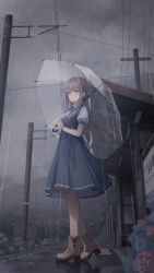 1girl amane_utata blue_dress blunt_bangs blush boots bracelet brown_boots brown_eyes brown_hair buttons character_request cloud collared_dress copyright_request dark_clouds dress full_body highres holding holding_umbrella jewelry rain road scenery short_sleeves solo standing umbrella utility_pole
