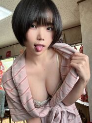 Rule 34 | 1girl, absurdres, asian, black hair, bra, breasts, cleavage, highres, indoors, leaning forward, looking at viewer, medium breasts, open clothes, open mouth, real life, short hair, solo, sumire live, tongue, tongue out, twitter username, underwear