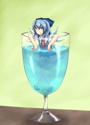 1girl :t bad_id bad_pixiv_id black_shoes blue_eyes blue_hair bow cirno cup daigada dress female_focus glass green_background hair_bow highres in_container in_cup matching_hair/eyes mini_person minigirl mundane_utility partially_submerged pout ribbon shoes short_hair solo touhou water wings
