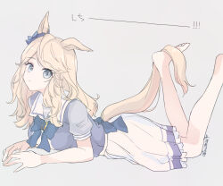 1girl animal_ears back_bow barefoot blonde_hair blue_bow blue_bowtie blue_eyes bow bowtie commentary_request ear_ribbon feet_up gold_city_(umamusume) grey_background horse_ears horse_girl horse_tail inutose long_hair looking_at_viewer lying on_stomach school_uniform short_sleeves solo sound_effects sound_effects_only tail tracen_school_uniform twitter_username umamusume