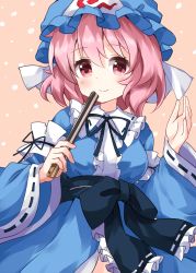 1girl black_sash blue_hat blue_kimono blue_ribbon blue_sleeves closed_mouth cowboy_shot folded_fan folding_fan hair_between_eyes hand_fan hat highres japanese_clothes kimono long_sleeves looking_at_viewer medium_hair mob_cap neck_ribbon orange_background pink_eyes pink_hair ribbon ribbon-trimmed_collar ribbon-trimmed_sash ribbon-trimmed_sleeves ribbon_trim ruu_(tksymkw) saigyouji_yuyuko sash simple_background smile solo spiral standing touhou triangular_headpiece white_ribbon wide_sleeves