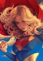 1girl blonde_hair blue_eyes cape dc_comics highres kara_danvers lipstick long_hair looking_at_viewer makeup red_cape solo supergirl superhero_costume superman_(series) superman_logo uzuri_art