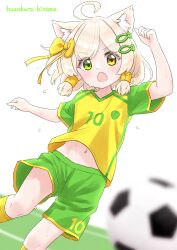 1boy ahoge animal_ears ball blurry blurry_background blurry_foreground cat_boy cat_ears cat_tail depth_of_field fish_hair_ornament green_eyes green_shorts hair_ornament hair_tubes hazakura_hinata heterochromia highres kaya_(hazakura_hinata) looking_at_viewer male_focus navel open_mouth original shirt short_hair short_shorts short_sleeves shorts simple_background soccer_ball soccer_uniform solo sportswear t-shirt tail trap white_background yellow_eyes