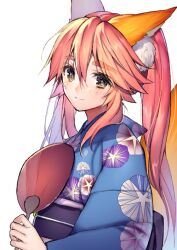 1girl alternate_costume animal_ear_fluff animal_ears blue_kimono blue_sash blush fate/grand_order fate_(series) floral_print fox_ears fox_girl fox_tail from_side hair_between_eyes hand_fan holding holding_fan japanese_clothes kimono long_hair looking_at_viewer mogullaz obi paper_fan pink_hair print_kimono red_fan sash sidelocks simple_background smile solo split_ponytail standing tail tamamo_(fate) tamamo_no_mae_(fate) thick_eyebrows turning_head uchiwa upper_body white_background yellow_eyes yukata