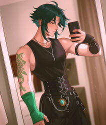 1boy aqua_hair arm_tattoo black_gloves black_hair black_pants black_sleeves black_tank_top cellphone chalseu closed_mouth facial_mark fingerless_gloves forehead_mark genshin_impact gloves green_gloves green_sleeves highres holding holding_phone jewelry male_focus multicolored_hair necklace pants phone smartphone solo tank_top tattoo xiao_(genshin_impact) yellow_eyes