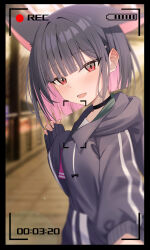 1girl absurdres animal_ears black_choker black_hair black_jacket blue_archive blunt_bangs blunt_ends blush cat_ears cat_girl choker colored_inner_hair extra_ears highres jacket kazusa_(blue_archive) looking_at_viewer multicolored_hair open_mouth pink_eyes short_hair sidelocks solo two-tone_hair viewfinder wendao